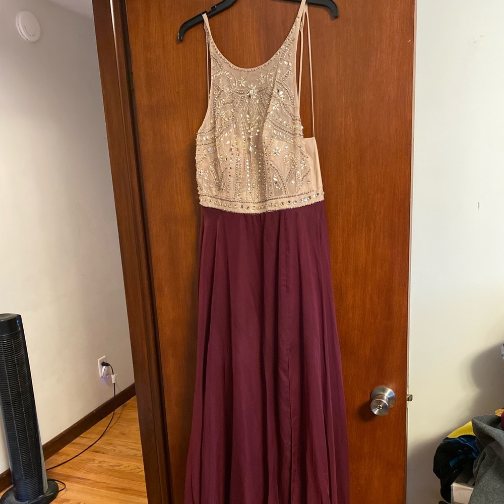 Prom dress. Burgundy slit skirt and tan top with rhinestones